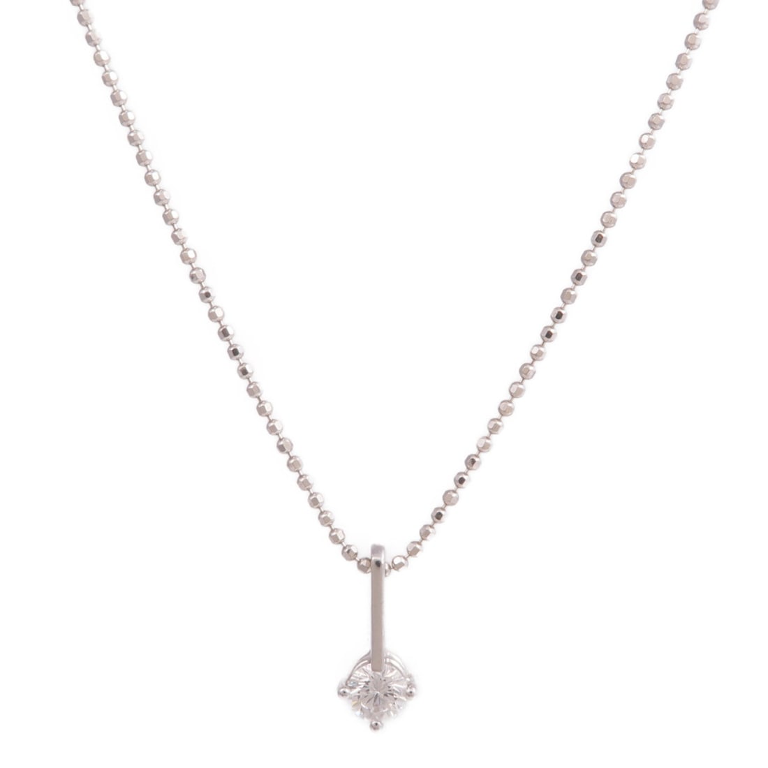 Diamond Pendant on 18K White Gold Necklace: Diamond Pendant on 18K White Gold Necklace This necklace features an elegant design crafted from 18K white gold and is adorned with a diamond as its main stone. The piece presents a silver tone and is