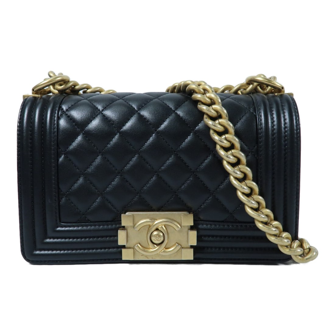 Black Calfskin Chanel Boy 20 Shoulder Bag with Gold Hardware: Black Calfskin Chanel Boy 20 Shoulder Bag with Gold Hardware This CHANEL Boy shoulder bag features a black calfskin leather exterior and gold-tone hardware. Designed for women, it offers a stylish and