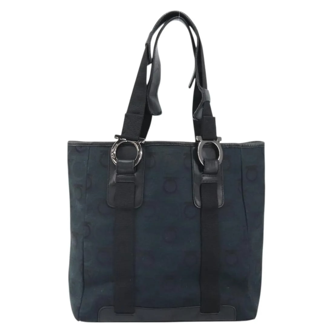 Gancini Tote Bag in Navy Canvas by Salvatore Ferragamo: Gancini Tote Bag in Navy Canvas by Salvatore Ferragamo This Salvatore Ferragamo Gancini Tote is crafted from navy canvas and designed for women. The tote features leather accents and metal fittings. N