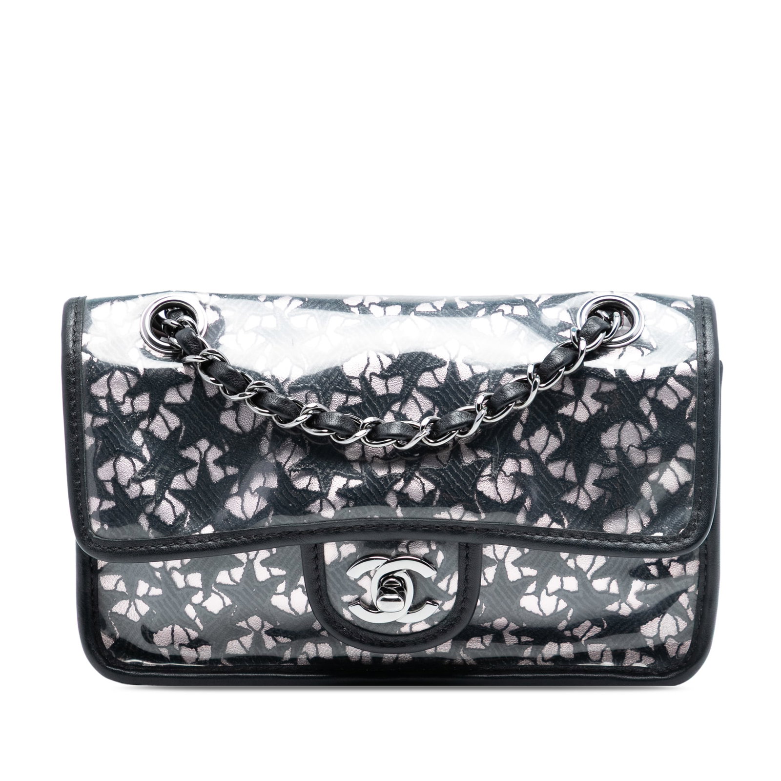 Chanel Star Lace PVC Flap Shoulder Bag with Leather Trim: Chanel Star Lace PVC Flap Shoulder Bag with Leather Trim This Chanel Small PVC Star Lace Single Flap shoulder bag features a PVC overlay with star-patterned lace, complemented by leather trim. It is d