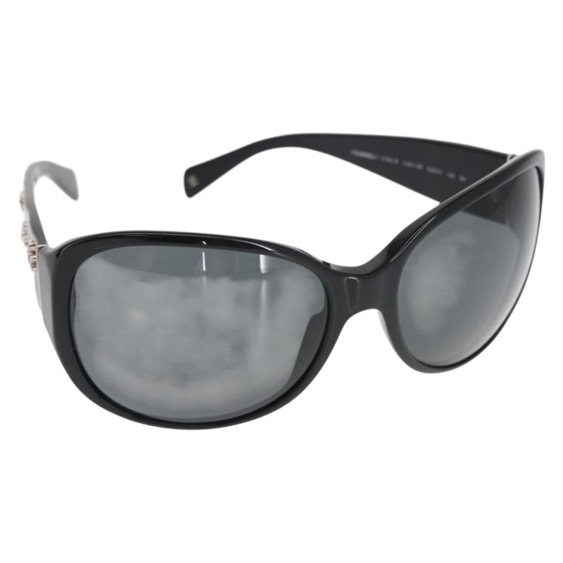 Black Plastic CHANEL Sunglasses with CC Logo and Accessories: Black Plastic CHANEL Sunglasses with CC Logo and Accessories These CHANEL sunglasses feature a classic black design crafted from durable plastic. Made in Italy, they include a dust bag, item box, and 