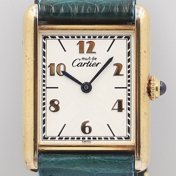 Cartier Must Tank Ladies Quartz Wristwatch SV925: Cartier Must Tank Ladies Quartz Wristwatch SV925 This Cartier Must Tank SV925 159080 590005 QZ 2DIT is a vintage quartz wristwatch designed for women. Made in Switzerland, it features the renowned qua