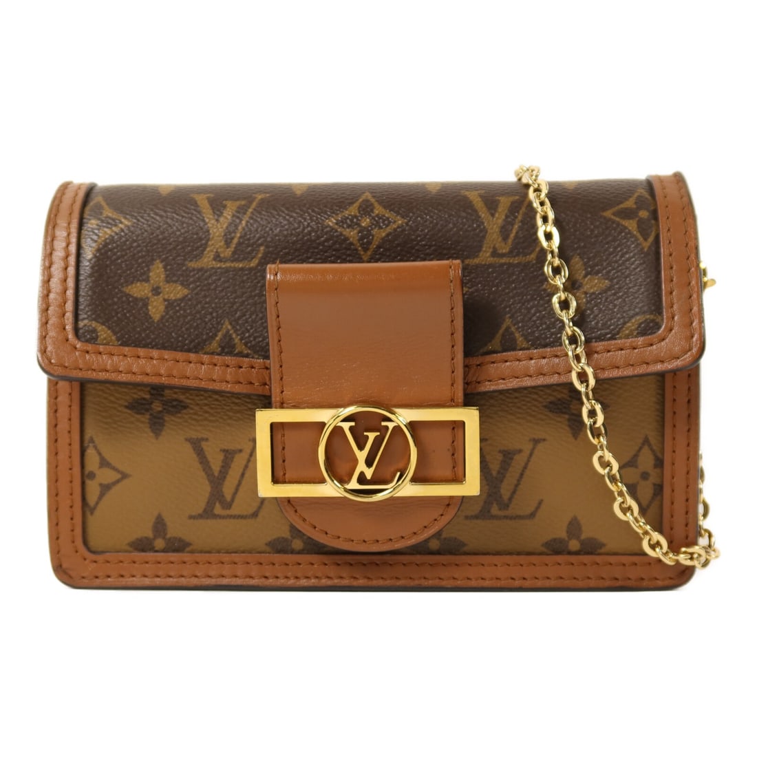 Louis Vuitton Dauphine Monogram Reverse Shoulder Bag with Gold Hardware M68746: Louis Vuitton Dauphine Monogram Reverse Shoulder Bag with Gold Hardware M68746 This Louis Vuitton Dauphine chain shoulder bag features the signature Monogram Reverse design in brown PVC coated canvas.