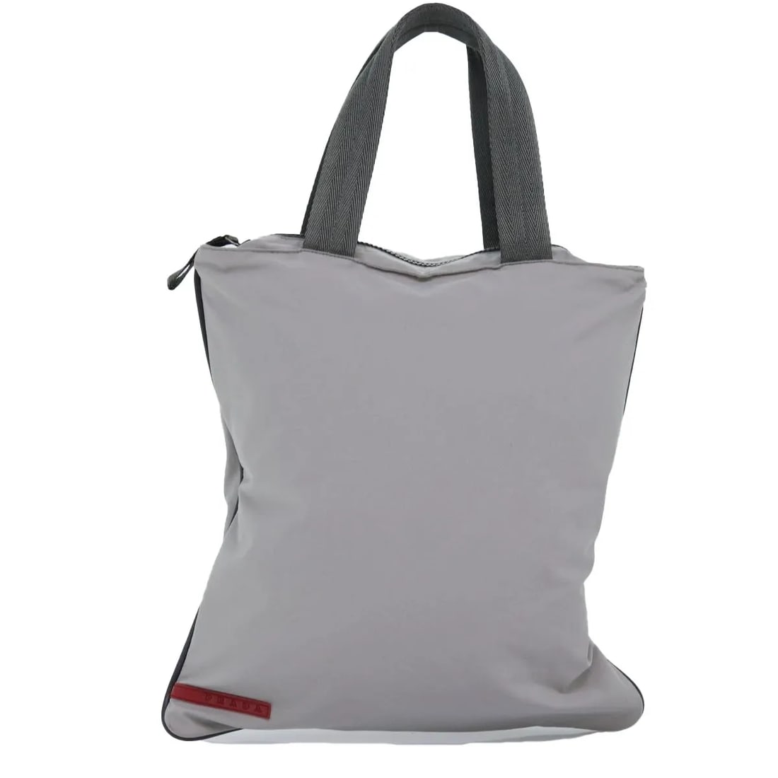 Prada Sport gray nylon tote bag made in Italy: Prada Sport gray nylon tote bag made in Italy This Prada Sport Tote bag is crafted from gray nylon and designed for women. Made in Italy, it features a spacious interior and sturdy handles. The bag sh
