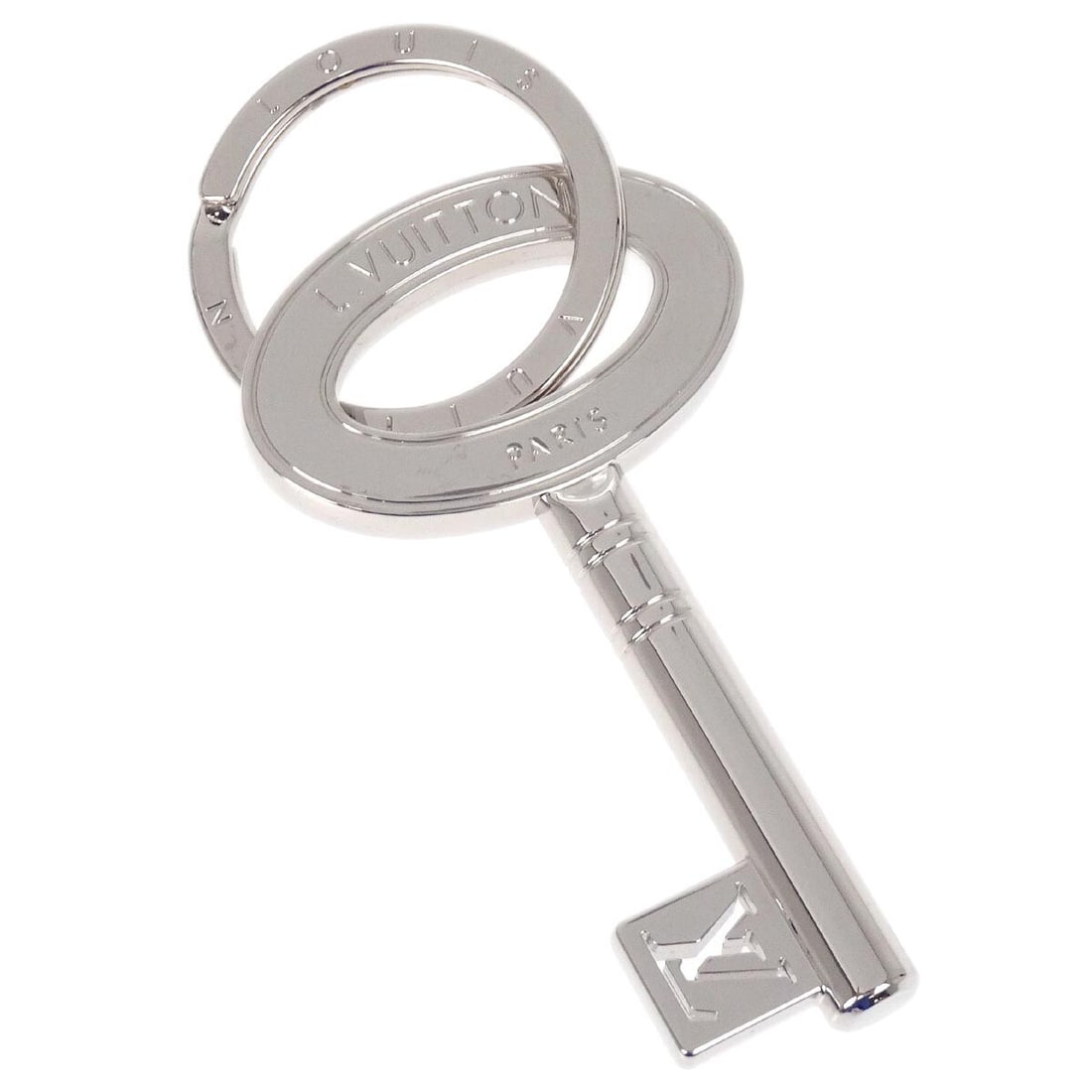 Louis Vuitton M67143 silver plated key chain logo charm: Louis Vuitton M67143 silver plated key chain logo charm Vintage Louis Vuitton Porte Cle Travel key ring in silver-plated metal with a logo charm design. This unisex key chain is made in Italy and is o