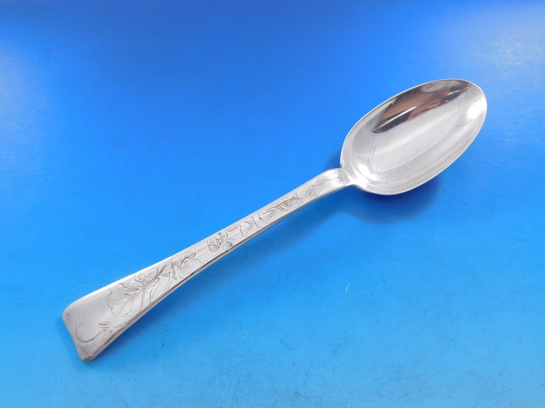 Tiffany Sterling Silver Serving Spoon Lap Over Edge Floral 8 5/8 in: Tiffany Sterling Silver Serving Spoon Lap Over Edge Floral 8 5/8 in This exquisite serving spoon from Tiffany & Co. features the elegant Lap Over Edge pattern, crafted from high-quality sterling silve