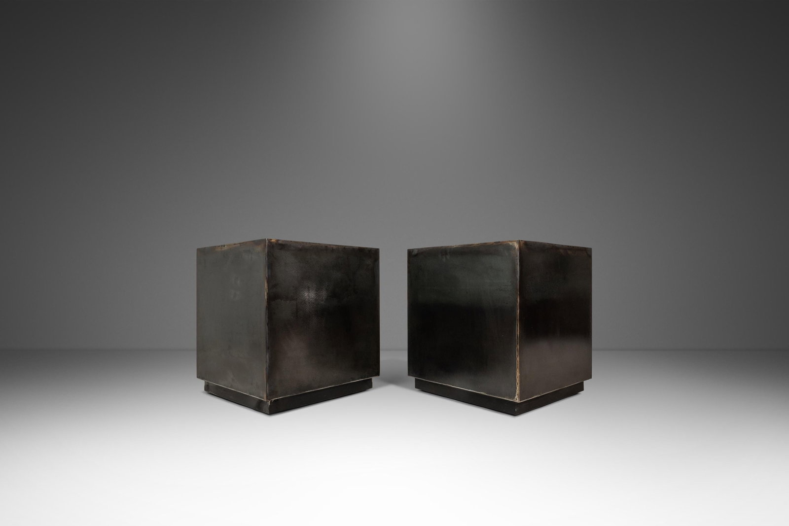 Pair of 1970s Brutalist Patinaed Metal Cubist End Tables or Pedestals: Pair of 1970s Brutalist Patinaed Metal Cubist End Tables or Pedestals This set includes two Mid-Century Modern industrial Brutalist cubes that can be used as end tables or pedestals. Crafted in the Un