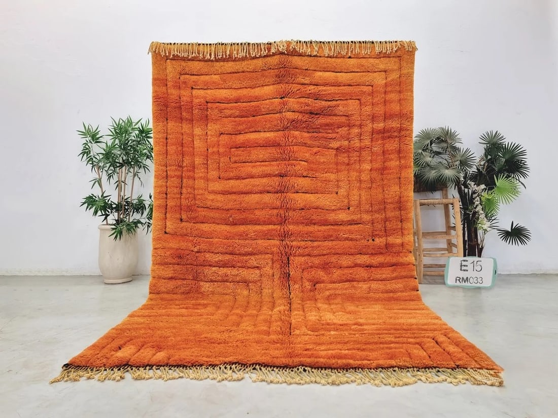 Luxury Handmade Orange Engraved Wool Rug 8 x 5 Feet Morocco: Luxury Handmade Orange Engraved Wool Rug 8 x 5 Feet Morocco Experience the elegance of a Luxury Handmade Soft Orange Engraved Wool Rug, meticulously crafted by skilled Berber women weavers in the Atla