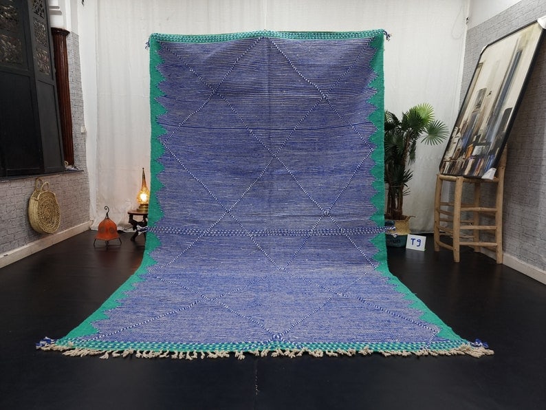 Authentic Handwoven Moroccan Rug 10 x 5 Feet: Authentic Handwoven Moroccan Rug 10 x 5 Feet This stylish authentic rug is handwoven in the Atlas Mountains by local Berber women weavers, utilizing traditional tools and natural local wool. It showca