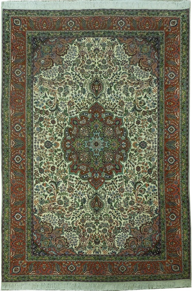 Persian Tabriz Rug 6.9 x 10 Handmade in Iran Wool and Silk: Persian Tabriz Rug 6.9 x 10 Handmade in Iran Wool and Silk Free continental US Shipping This 6.9 x 10 Persian Tabriz rug is a high-quality, hand-knotted piece crafted in Iran. Made from a blend of pre