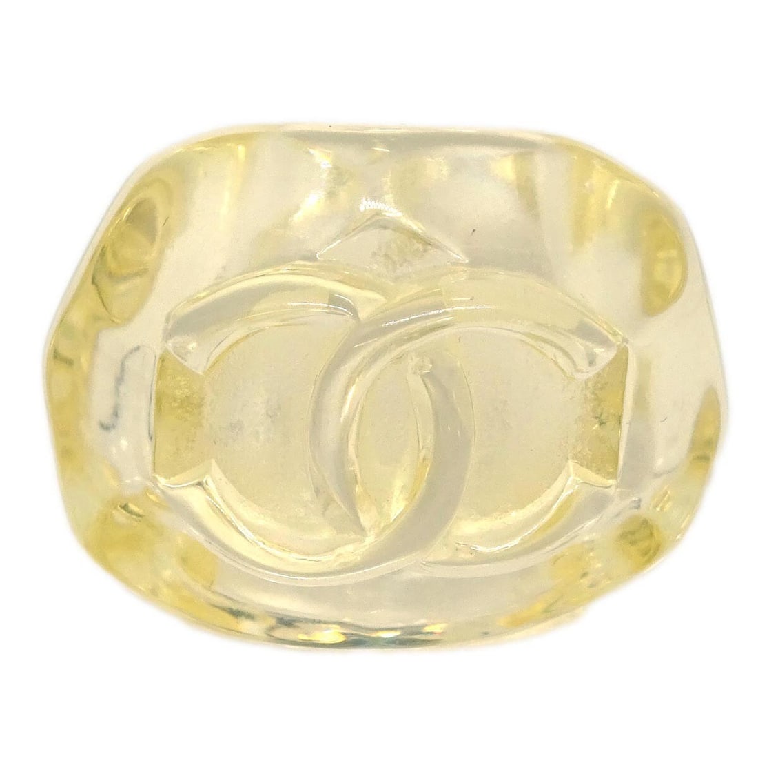 Chanel Clear Acrylic Ring Size 13 France 02P: Chanel Clear Acrylic Ring Size 13 France 02P Vintage Chanel clear acrylic ring with an embossed logo design. It comes with the box and shows discoloration consistent with the noted condition. Specific