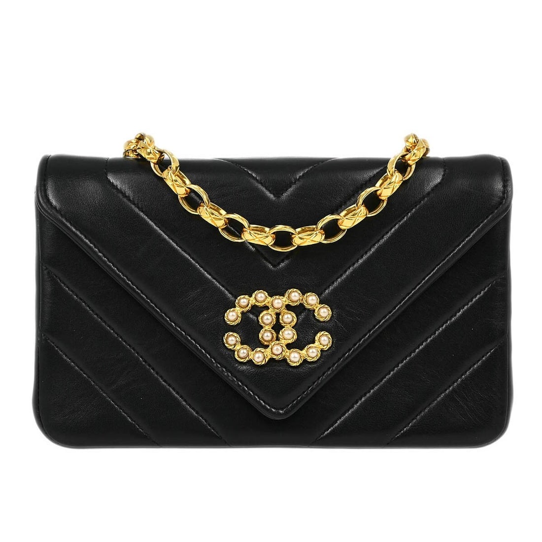 CHANEL Mademoiselle small black lambskin shoulder bag with pearl accents: CHANEL Mademoiselle small black lambskin shoulder bag with pearl accents Chanel Mademoiselle shoulder bag in black lambskin leather with a chevron matelasse quilted design and artificial pearl detail.