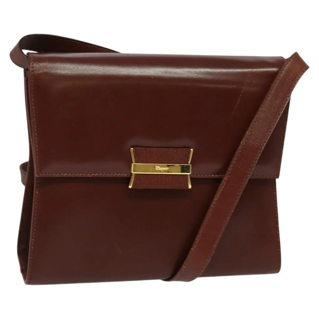 Brown Leather Handbag Salvatore Ferragamo Vintage 21cm Italy: Brown Leather Handbag Salvatore Ferragamo Vintage 21cm Italy Vintage Salvatore Ferragamo leather bag in brown. Made in Italy, this women's accessory shows honest vintage wear consistent with age and u