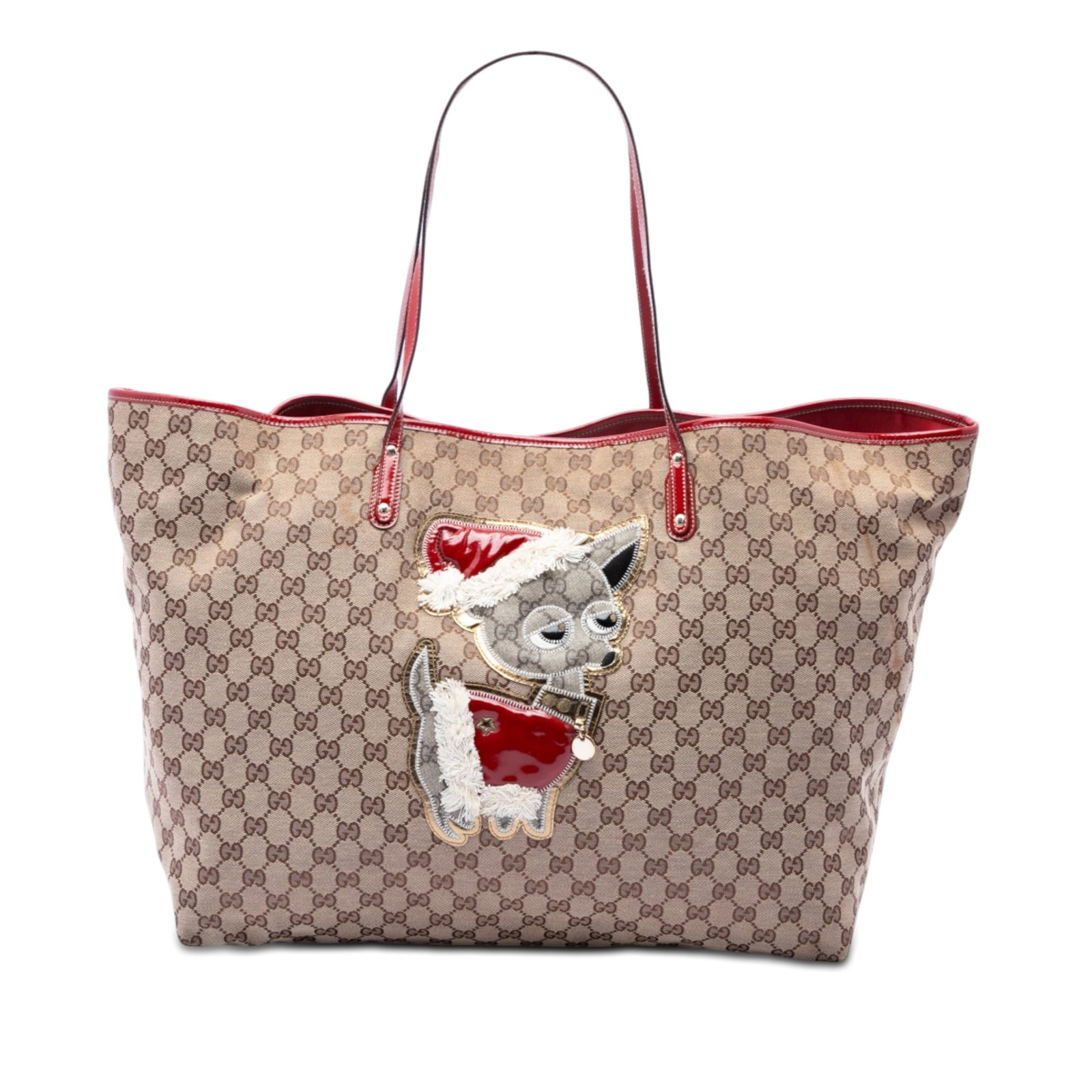 Gucci GG Canvas Chihuahua Tote Bag with Leather Trim: Gucci GG Canvas Chihuahua Tote Bag with Leather Trim Gucci GG Canvas Brando Guccioli Holiday Chihuahua tote in beige fabric with leather trim and flat leather shoulder straps. The open-top design feat