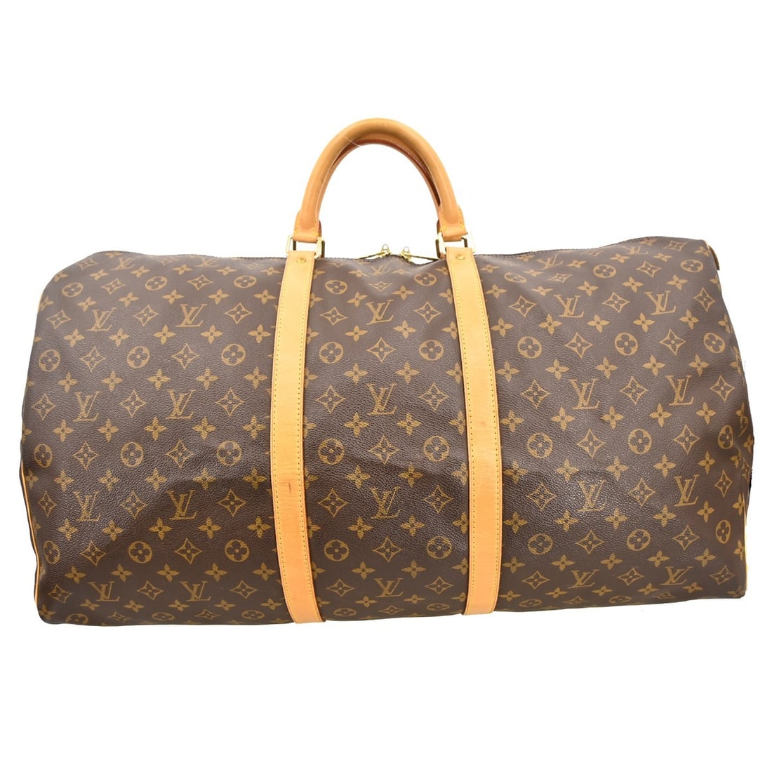 Louis Vuitton Keepall 60 Monogram Canvas Duffle Bag M41422: Louis Vuitton Keepall 60 Monogram Canvas Duffle Bag M41422 Vintage Louis Vuitton Keepall 60 travel handbag in Monogram canvas with leather trim and double handles. This extra-large duffle-style bag fe