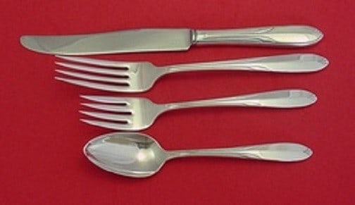 National Overture Sterling Silver 4-Piece Place Setting: National Overture Sterling Silver 4-Piece Place Setting This exquisite 4-piece place setting from the Overture pattern by National is crafted from high-quality sterling silver and dates back to the ea