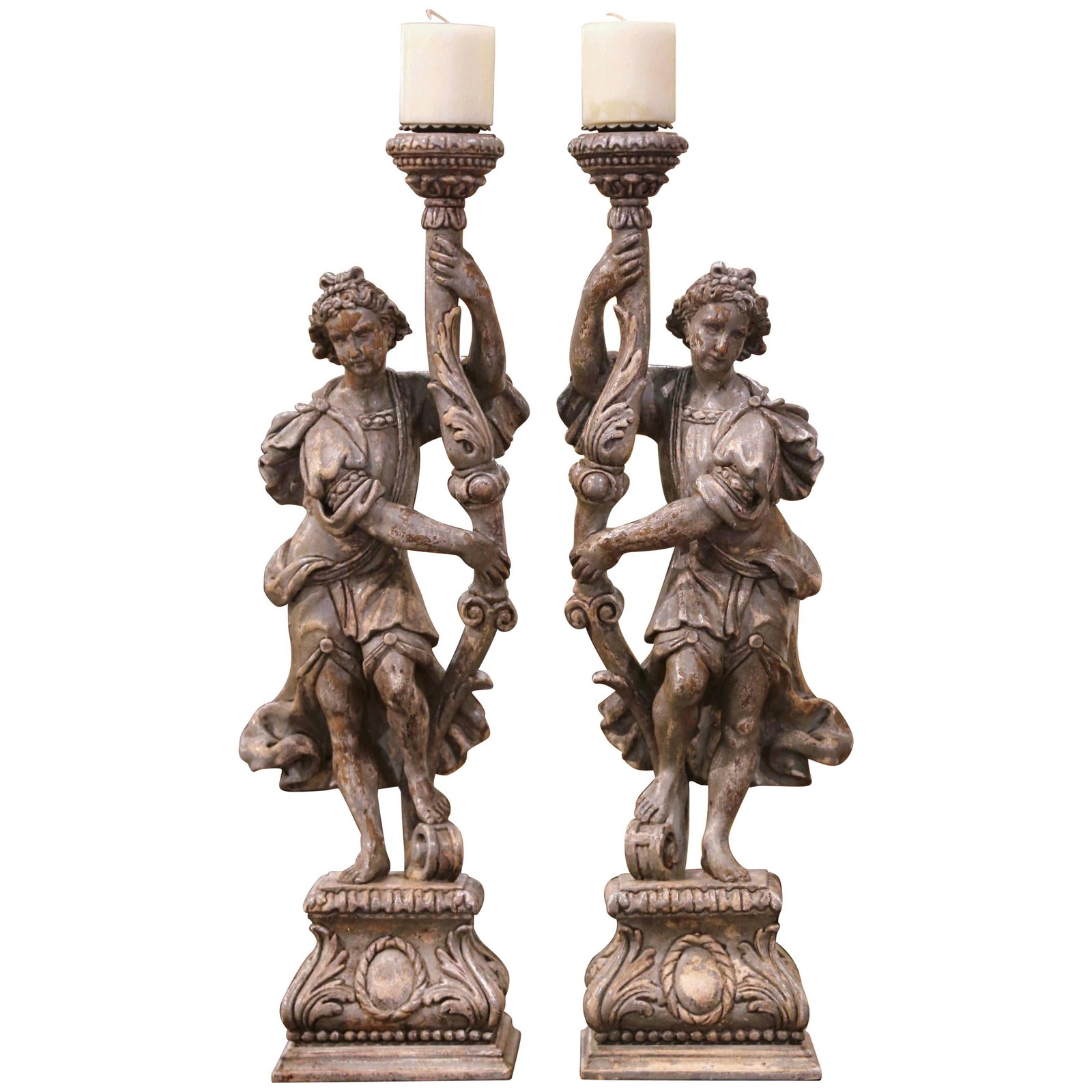 19th Century Italian Neoclassical Hand-Carved Oak Candlestick Set of 2: 19th Century Italian Neoclassical Hand-Carved Oak Candlestick Set of 2 Enhance your space with this exquisite pair of 19th-century Italian Neoclassical painted oak figural candlesticks. Crafted circa 