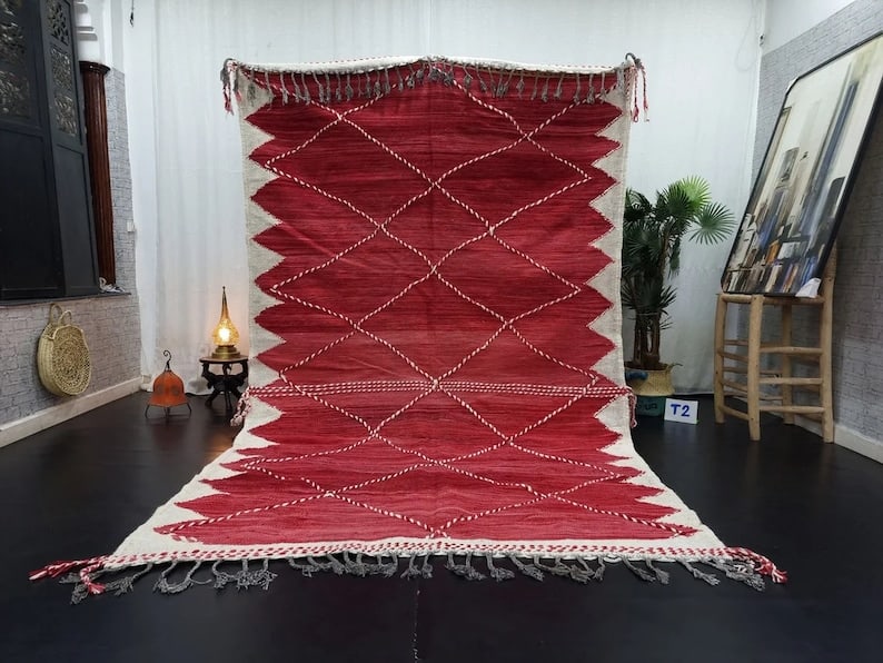 Handwoven Moroccan Rug 10 x 5 Feet Berber Craftsmanship: Handwoven Moroccan Rug 10 x 5 Feet Berber Craftsmanship Discover the beauty of this Fabulous Authentic Rug, meticulously handwoven in the Atlas Mountains by skilled local Berber women weavers. Crafted