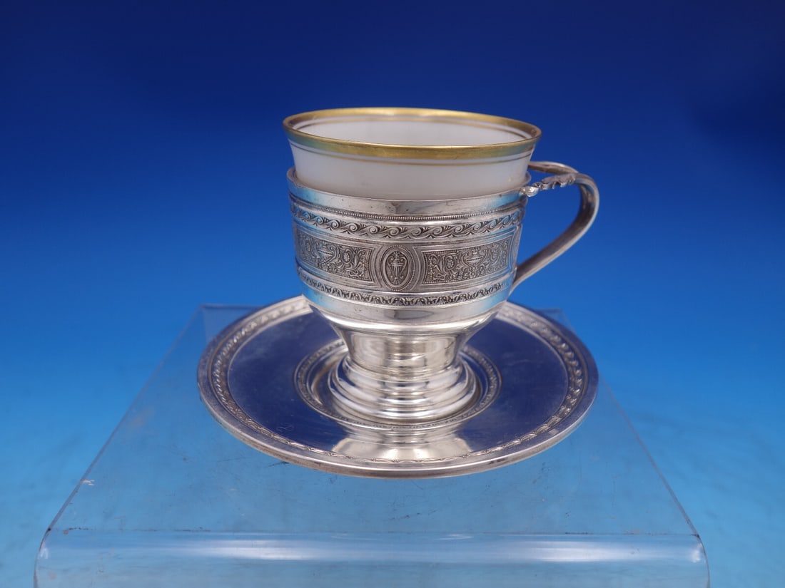 Wedgwood International Sterling Silver Demitasse Cup Saucer Set: Wedgwood International Sterling Silver Demitasse Cup Saucer Set This exquisite Wedgwood by International sterling silver demitasse cup and saucer set features a delicate porcelain liner, showcasing a 