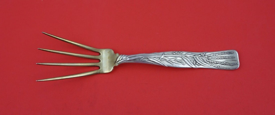 Tiffany Vine Sterling Silver 8" Baked Potato Fork Gold Washed: Tiffany Vine Sterling Silver 8" Baked Potato Fork Gold Washed This exquisite serving fork from Tiffany & Co. features the elegant Vine pattern, crafted from sterling silver. Designed for serving baked