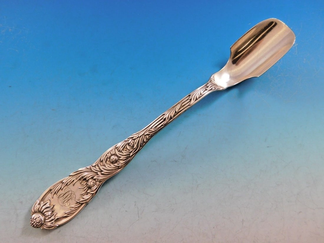 Sterling Silver Cheese Scoop 9 1/4 Inch Chrysanthemum Pattern by Tiffany: Sterling Silver Cheese Scoop 9 1/4 Inch Chrysanthemum Pattern by Tiffany This is a sterling silver cheese scoop in the Chrysanthemum pattern by Tiffany & Co., originally designed by Charles Grosjean i
