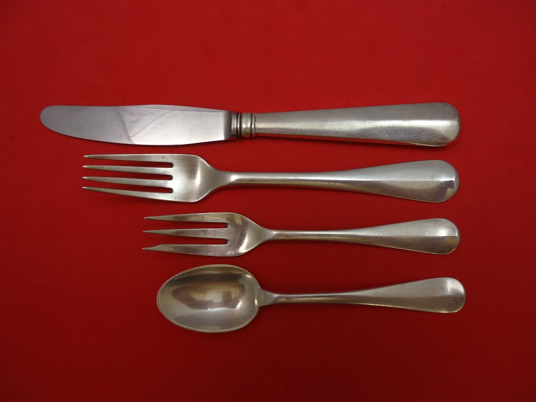 Peter Hertz Rattail Sterling Silver 4-Piece Dinner Setting: Peter Hertz Rattail Sterling Silver 4-Piece Dinner Setting Enhance your dining experience with this exquisite 4-piece dinner place setting in the classic Rattail pattern by Peter Hertz. Crafted from