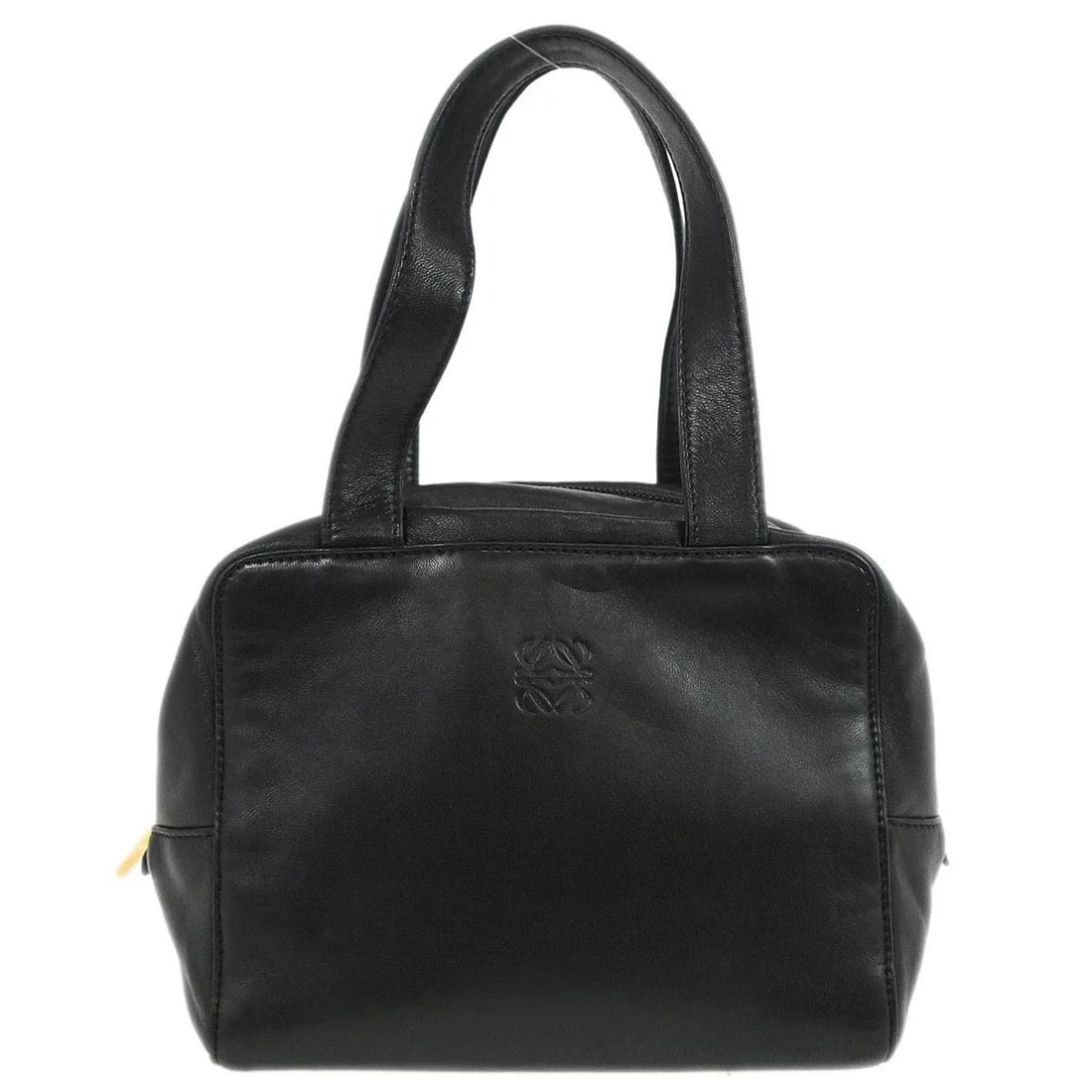 Loewe Anagram black leather handbag 18cm x 14cm x 12cm: Loewe Anagram black leather handbag 18cm x 14cm x 12cm The Loewe Anagram handbag is crafted from black leather and designed for women. It features a compact silhouette and is made in Spain. The exteri