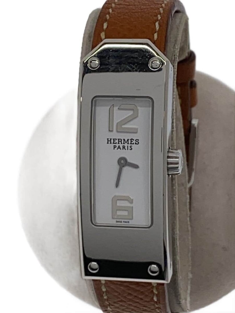 Hermes Kelly II KT1.210 Quartz Ladies Wristwatch Stainless Steel Leather: Hermes Kelly II KT1.210 Quartz Ladies Wristwatch Stainless Steel Leather This Hermes Kelly II Quartz women's wristwatch features a leather band and a stainless steel case. Made in Switzerland, it offe