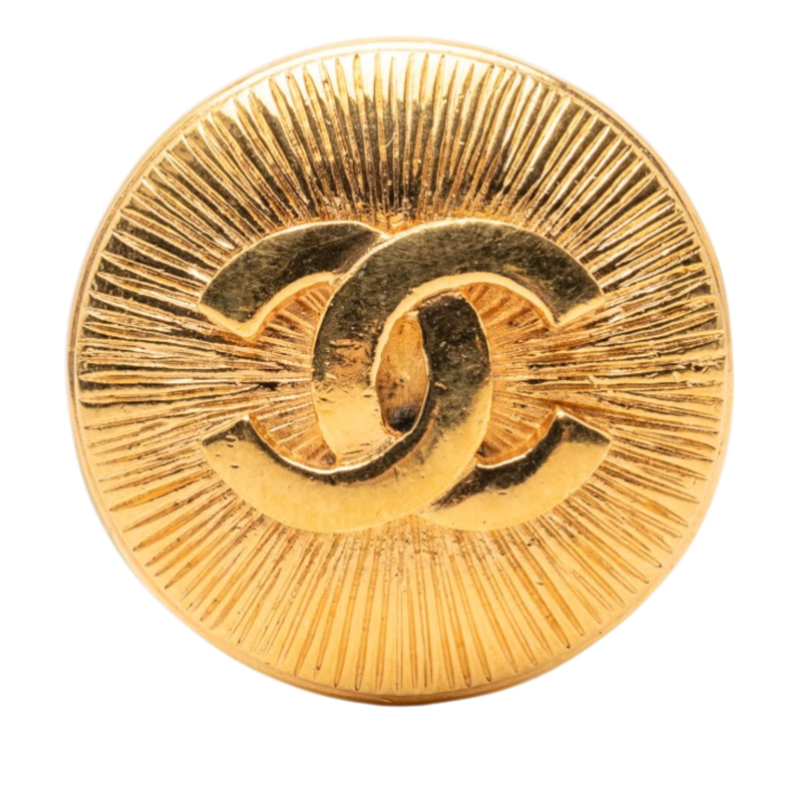 Chanel CC Logo Gold Plated Metal Round Brooch Pin: Chanel CC Logo Gold Plated Metal Round Brooch Pin This Chanel brooch features a round design with the iconic CC logo, crafted from gold-plated metal. It is equipped with a back pin closure and is cate