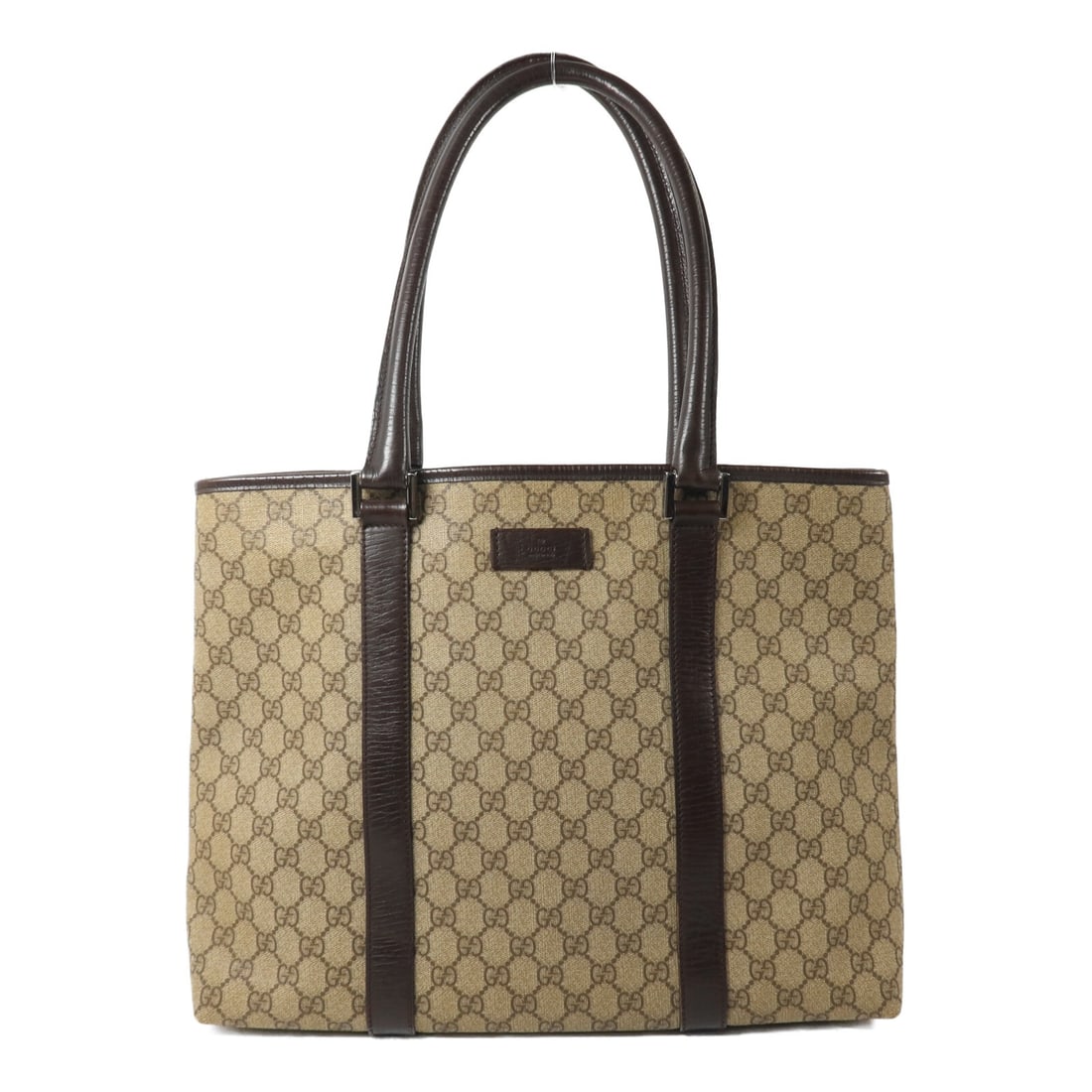 Gucci GG Tote Bag Brown Coated Canvas: Gucci GG Tote Bag Brown Coated Canvas This Gucci GG tote bag is crafted from durable brown PVC coated canvas, offering both style and practicality. Designed for women, it features a spacious interior 