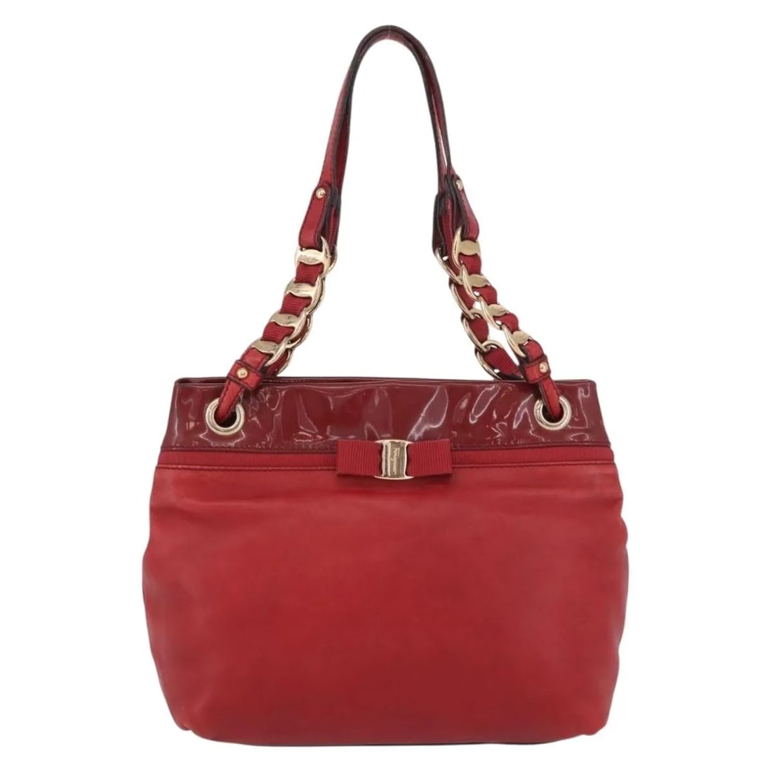 Vala Tote Bag in Red Leather by Salvatore Ferragamo: Vala Tote Bag in Red Leather by Salvatore Ferragamo This Salvatore Ferragamo Vala tote is crafted from red leather and designed for women. Made in Italy, the tote features a spacious interior and eleg
