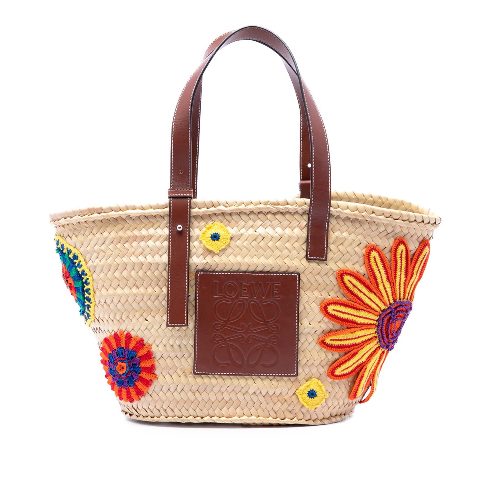 LOEWE Raffia Basket Tote with Floral Embroidery Large: LOEWE Raffia Basket Tote with Floral Embroidery Large Large LOEWE basket tote crafted with a raffia body and knitted floral details. It features flat leather shoulder straps and an open top. Made in S
