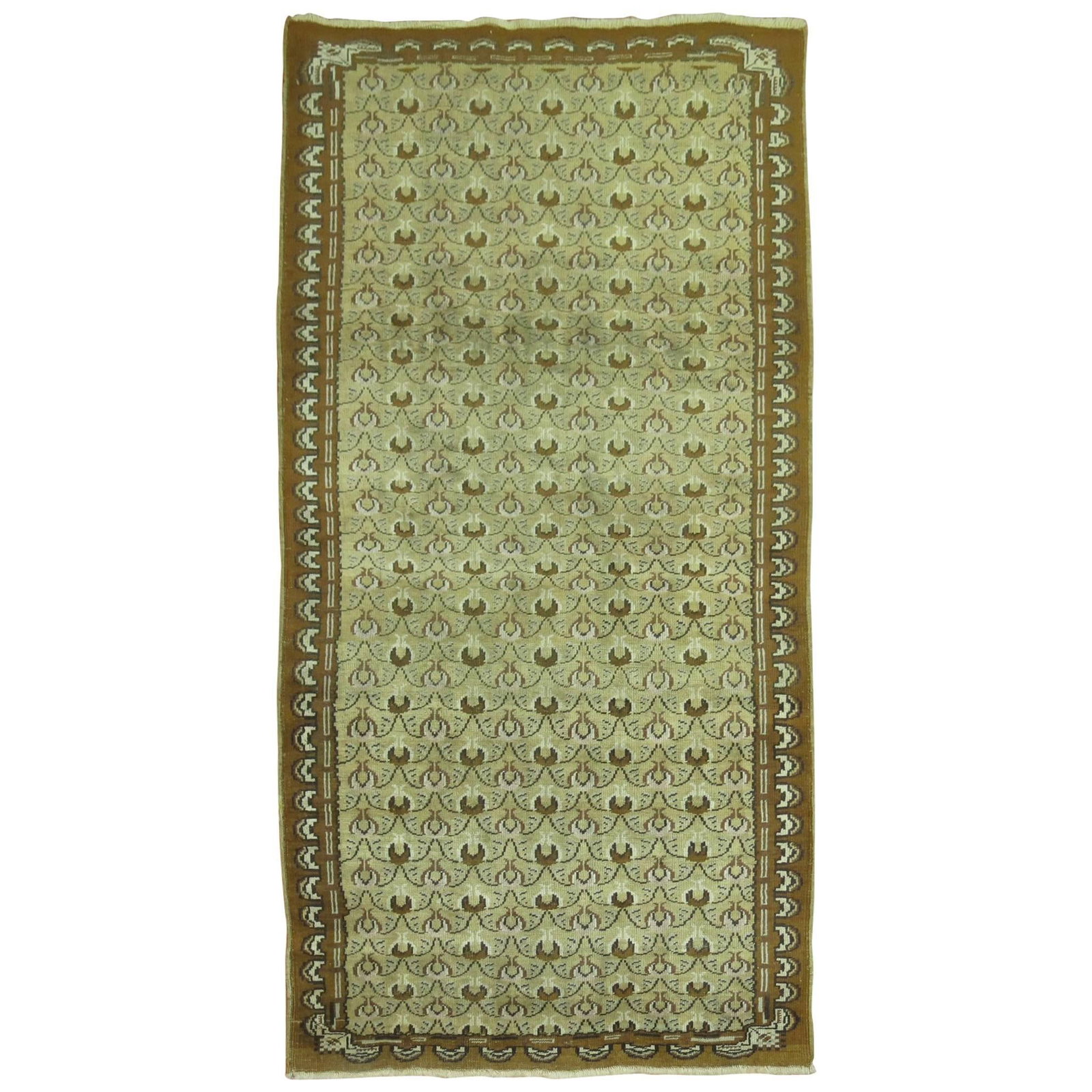 41 in x 79 in Hand-Knotted Wool Turkish Runner Rug Olive Brown: 41 in x 79 in Hand-Knotted Wool Turkish Runner Rug Olive Brown This vintage Turkish runner rug from the mid-20th century features an all-over tulip motif in olive green and brown tones. Hand-knotted f