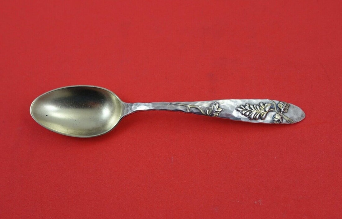 Tiffany & Co Lap Over Edge Sterling Silver Coffee Spoon Gold Wash 4 7/8": Tiffany & Co Lap Over Edge Sterling Silver Coffee Spoon Gold Wash 4 7/8" This elegant coffee spoon from Tiffany & Co. features the distinctive 'Lap Over Edge' pattern, crafted from sterling silver wit