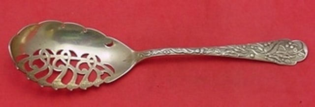 Knowles Sterling Silver Pierced Macaroni Server with Cherries 9 1/4": Knowles Sterling Silver Pierced Macaroni Server with Cherries 9 1/4" This exquisite macaroni server by Knowles features a beautiful pierced design accented with cherries, crafted from high-quality ste