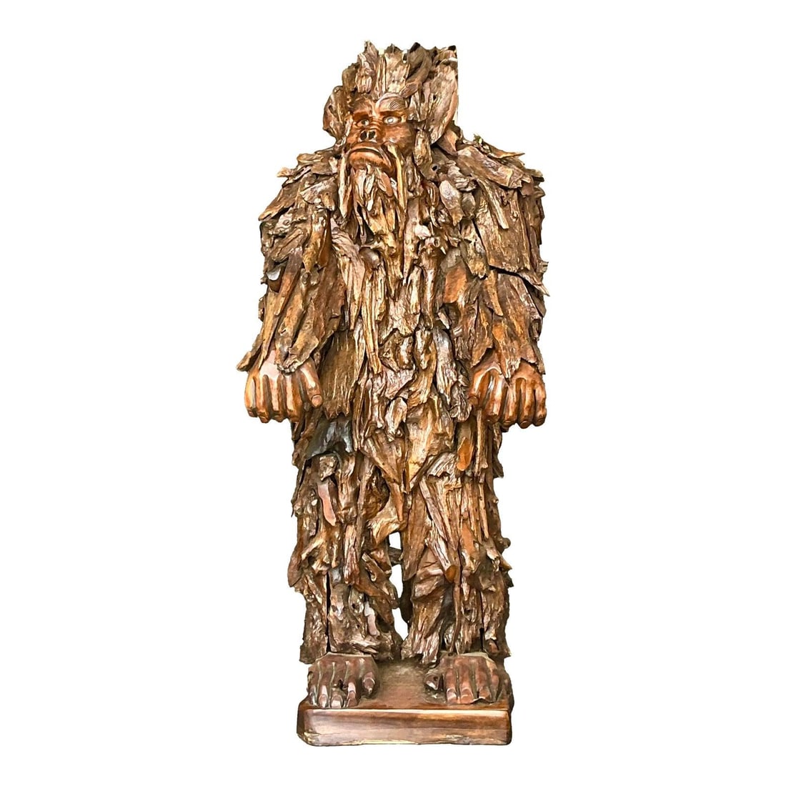 Monumental Hand-Carved Wood Sasquatch Figure in Boho Style 85 Inch Tall: Monumental Hand-Carved Wood Sasquatch Figure in Boho Style 85 Inch Tall This monumental vintage Sasquatch sculpture is hand-carved from natural wood, showcasing intricate, layered texture that mimics 