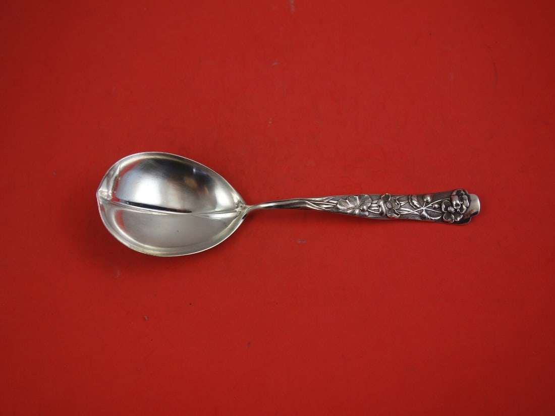 Shiebler Flora Sterling Silver Berry Spoon 8 3/4 Inch: Shiebler Flora Sterling Silver Berry Spoon 8 3/4 Inch This exquisite berry spoon features the intricate "Flora" pattern by Shiebler, crafted from high-quality sterling silver. Measuring 8 3/4 inches, 