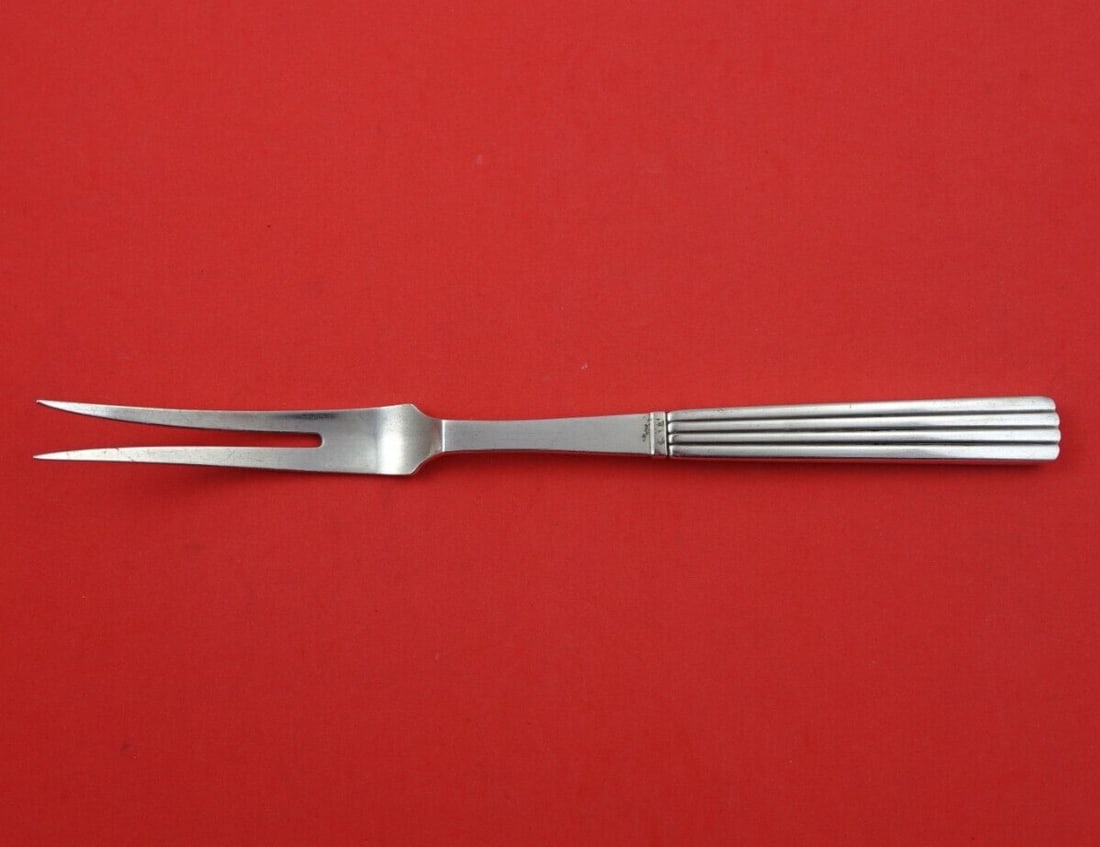 Georg Jensen Bernadotte Sterling Silver Serving Fork 2-Tine 9 3/4 Inch: Georg Jensen Bernadotte Sterling Silver Serving Fork 2-Tine 9 3/4 Inch This exquisite serving fork is part of the Bernadotte pattern by Georg Jensen, crafted from high-quality sterling silver (.925). 
