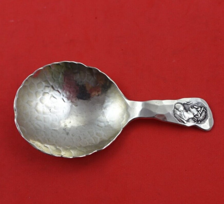 Shiebler Medallion Sterling Silver Tea Caddy Spoon with Man: Shiebler Medallion Sterling Silver Tea Caddy Spoon with Man This exquisite tea caddy spoon features the Medallion pattern, also known as Etruscan or Homeric, crafted by Shiebler. Made from high-qualit