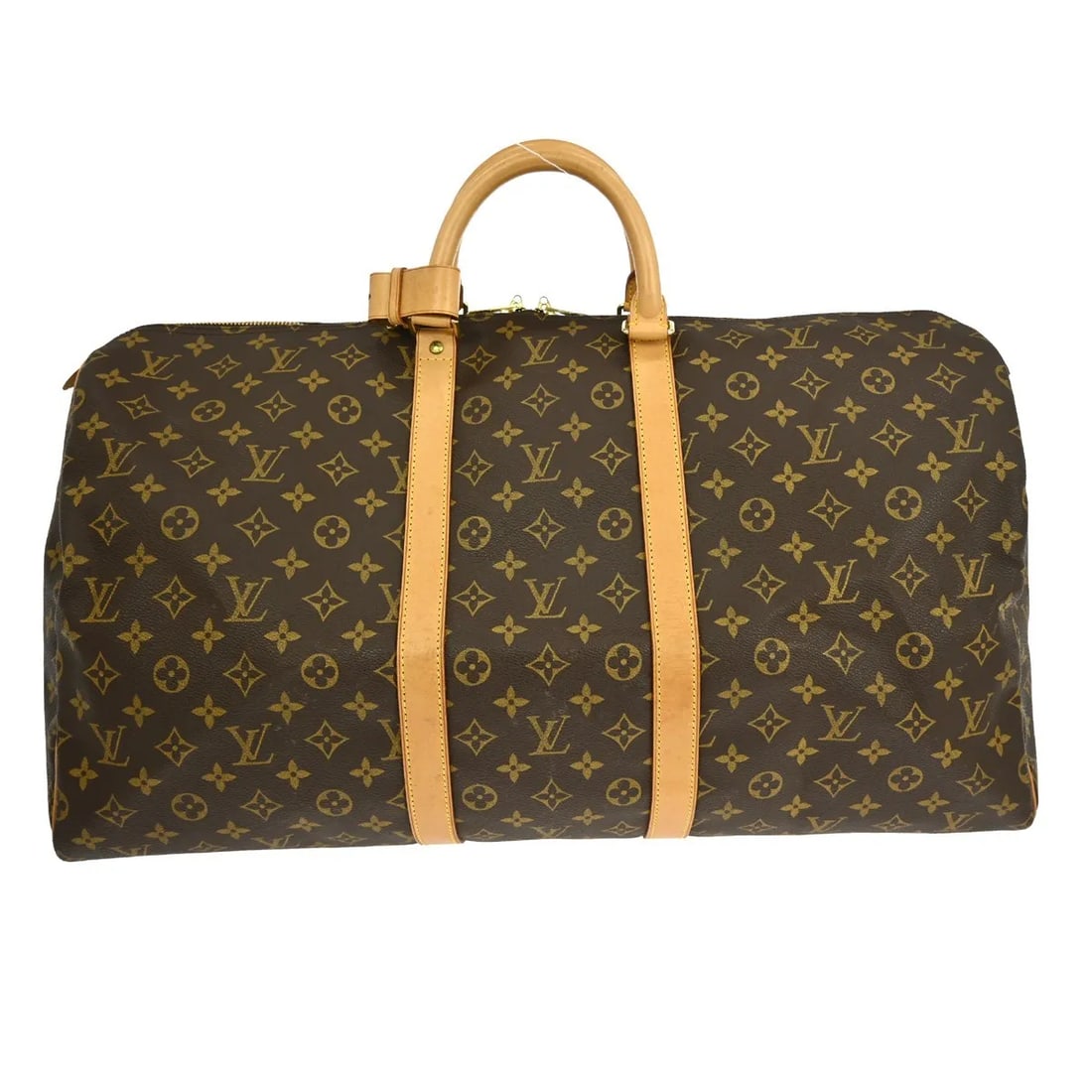 Louis Vuitton Keepall Travel Bag in Brown Monogram Canvas: Louis Vuitton Keepall Travel Bag in Brown Monogram Canvas Louis Vuitton Keepall in brown monogram canvas. This unisex travel bag is made in France and remains in good condition with visible wear from 