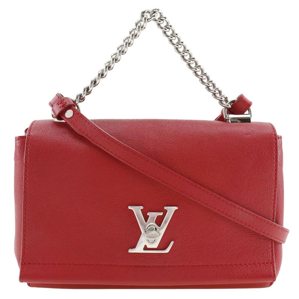Louis Vuitton Lockme II Red Leather Handbag: Louis Vuitton Lockme II Red Leather Handbag This Louis Vuitton Lockme II handbag for women features a red leather exterior with minor signs of use including fine scratches, minor stains, and slight th