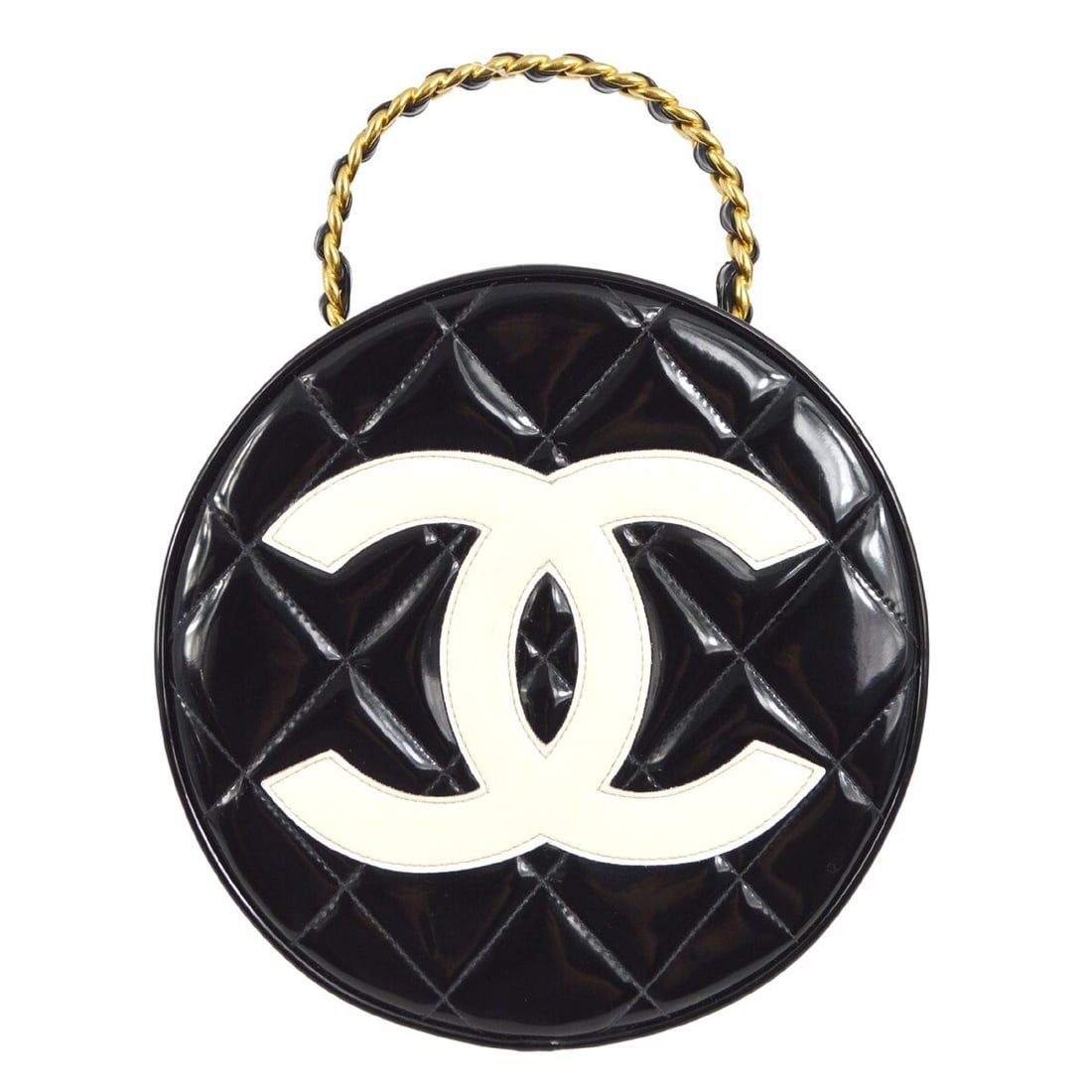CHANEL Quilted Round Vanity Bag in Black Patent Leather: CHANEL Quilted Round Vanity Bag in Black Patent Leather Chanel round vanity handbag in black patent leather with a zip closure and top handle. This medium satchel/top handle bag is made in France and 