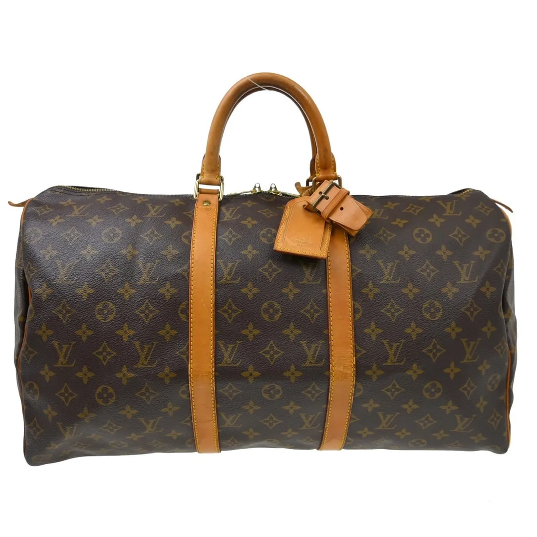 Louis Vuitton Keepall Brown Monogram Canvas Travel Bag: Louis Vuitton Keepall Brown Monogram Canvas Travel Bag Louis Vuitton Keepall in brown monogram canvas. This unisex bag is in good condition with visible wear. The exterior shows scuffs, cracks, tears,