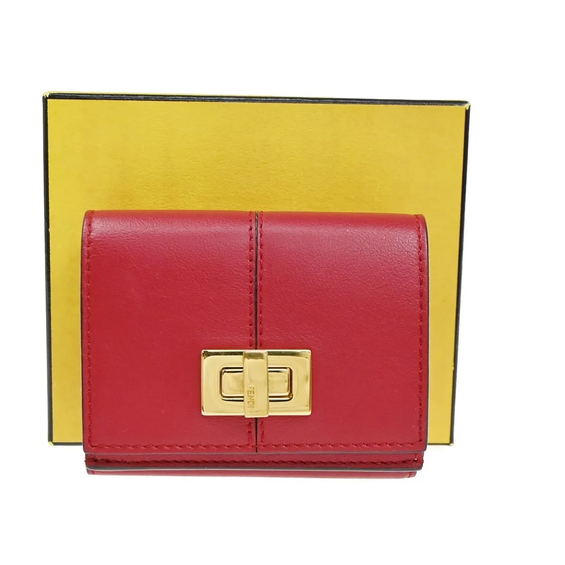 Fendi Peekaboo red leather wallet for women: Fendi Peekaboo red leather wallet for women This pre-owned Fendi Peekaboo Wallet is crafted from red leather and designed for women. It features a compact style with a leather exterior and interior. T