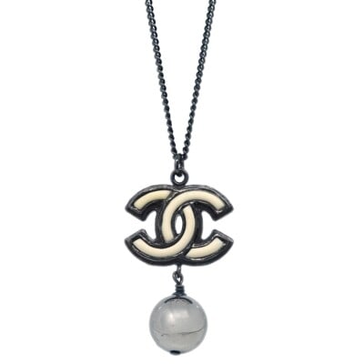 CHANEL B13B Silver Plated Pendant Necklace Black White: CHANEL B13B Silver Plated Pendant Necklace Black White Chanel chain necklace in silver plated metal with black and white acrylic accents. This piece features a charm detail and is marked B13B. Conditi