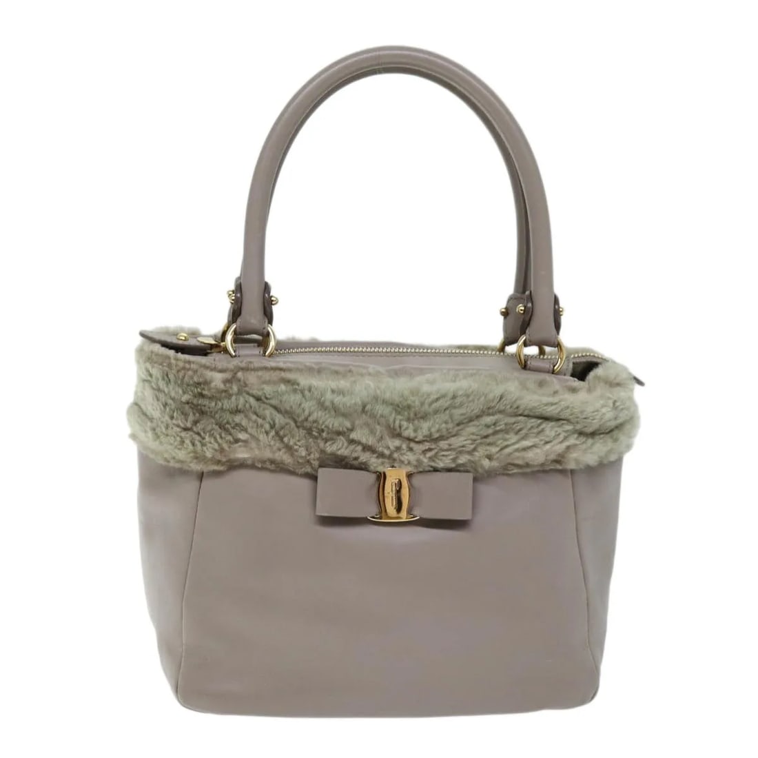 Pink Vala Leather Handbag by Salvatore Ferragamo: Pink Vala Leather Handbag by Salvatore Ferragamo This Salvatore Ferragamo Vala bag is crafted from pink leather and designed for women. It features a structured silhouette with dimensions of 23cm x 20
