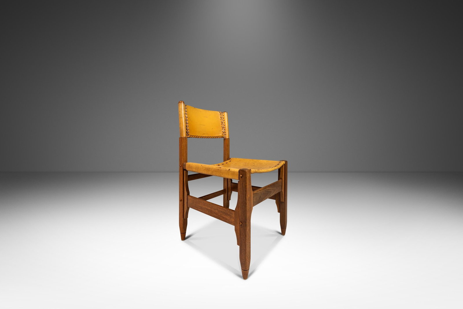 Vintage Safari Chair by Biermann Werner for Arte Sano Colombia 1960s: Vintage Safari Chair by Biermann Werner for Arte Sano Colombia 1960s Discover the charm of this vintage Colombian side chair, expertly crafted from tanned saddle leather and kiln-dried oak, designed b