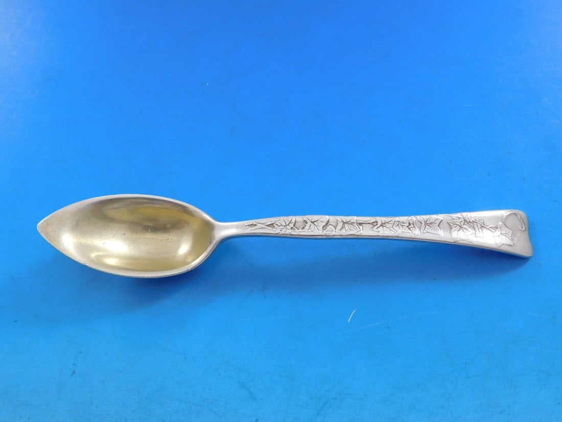 Tiffany Sterling Silver Grapefruit Spoon Lap Over Edge 6 Inch Ivy Motif: Tiffany Sterling Silver Grapefruit Spoon Lap Over Edge 6 Inch Ivy Motif This exquisite grapefruit spoon features the Lap Over Edge pattern, crafted by Tiffany & Co. from sterling silver. Measuring 6 i
