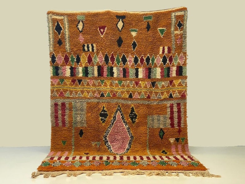 Authentic Handwoven Berber Rug 8 x 5 Feet Morocco: Authentic Handwoven Berber Rug 8 x 5 Feet Morocco Experience the charm of traditional craftsmanship with this Lovely Authentic Rug. Handwoven in the Atlas Mountains by skilled Berber women using tradi