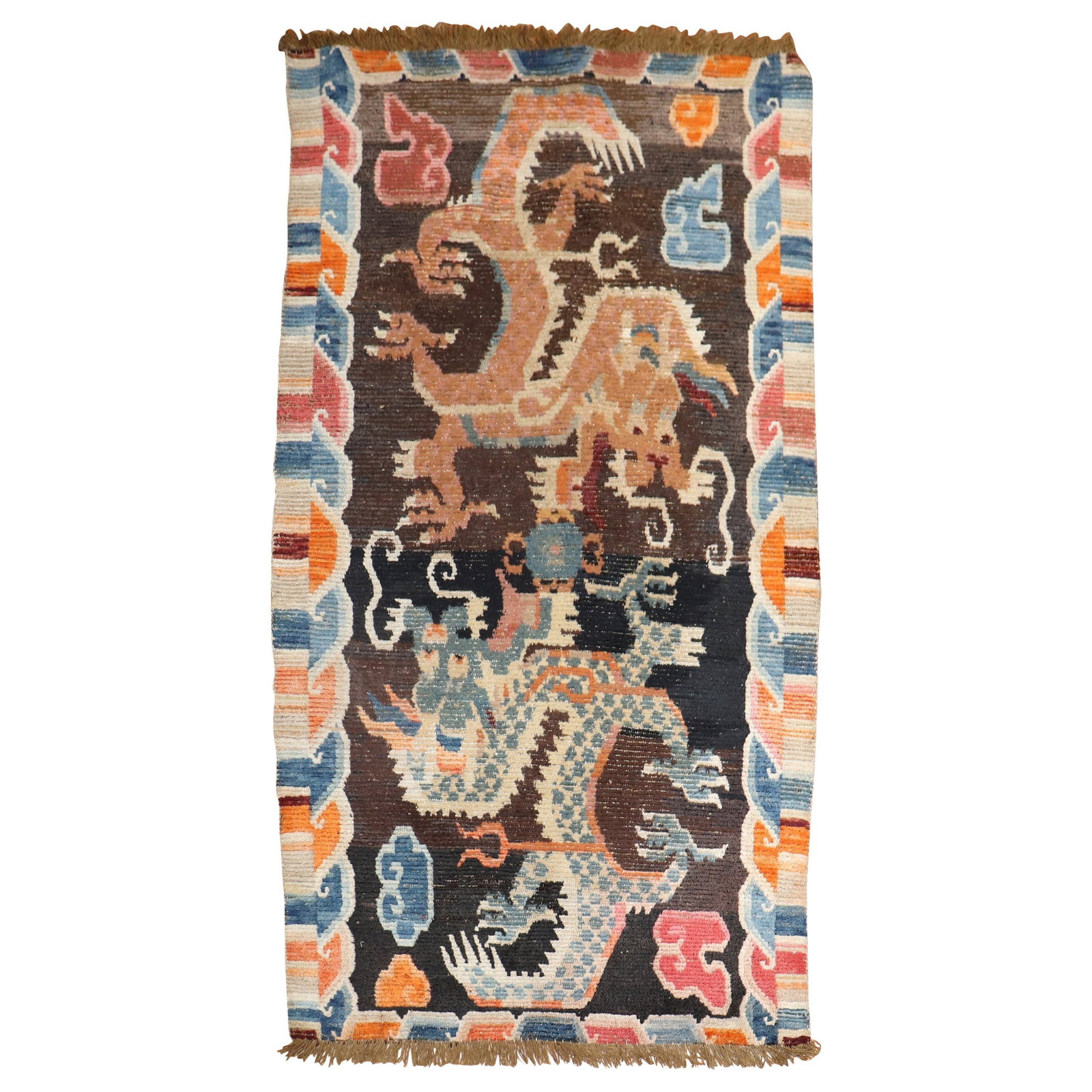 Vintage Tibetan Dragon Rug Early 20th Century Hand-Woven Wool 33 x 59: Vintage Tibetan Dragon Rug Early 20th Century Hand-Woven Wool 33 x 59 This stunning vintage Tibetan rug showcases a vibrant dragon motif, embodying the artistry of the early 20th century. Hand-woven f